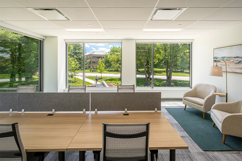 Flex at Chesterbrook's coworking space with rows of desks and dividers